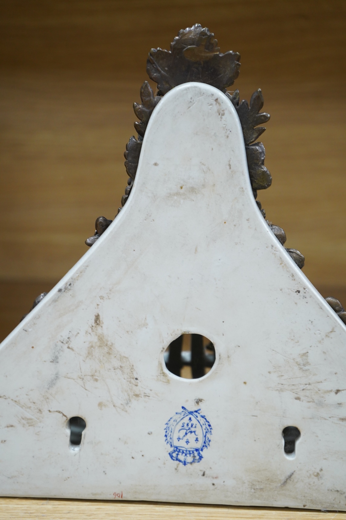 A pair of Sevres style pierced ceramic brackets with bronze mounts, 26 x 31cm